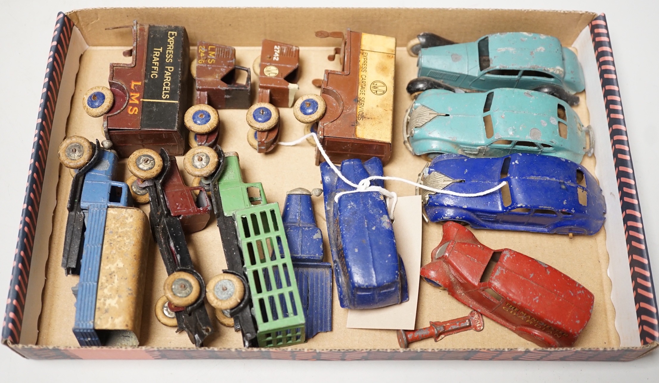 Rare pre-war Dinky toys including two 28-series, second-type delivery vans, Pickfords and Manchester Guardian